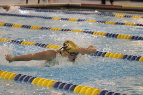CHS senior Riley Monohan slices through the water of the Beach Middle School pool