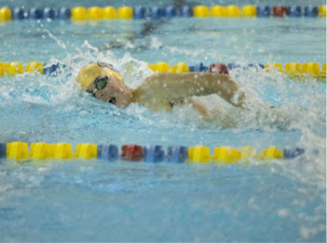 Shooting through the water. Owen Critchfield (‘23) is finishing off his last lap of the meet. 
