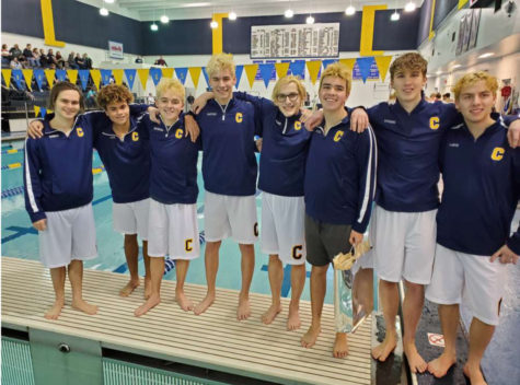 Stephen and his beautiful teammates smile for a team photo