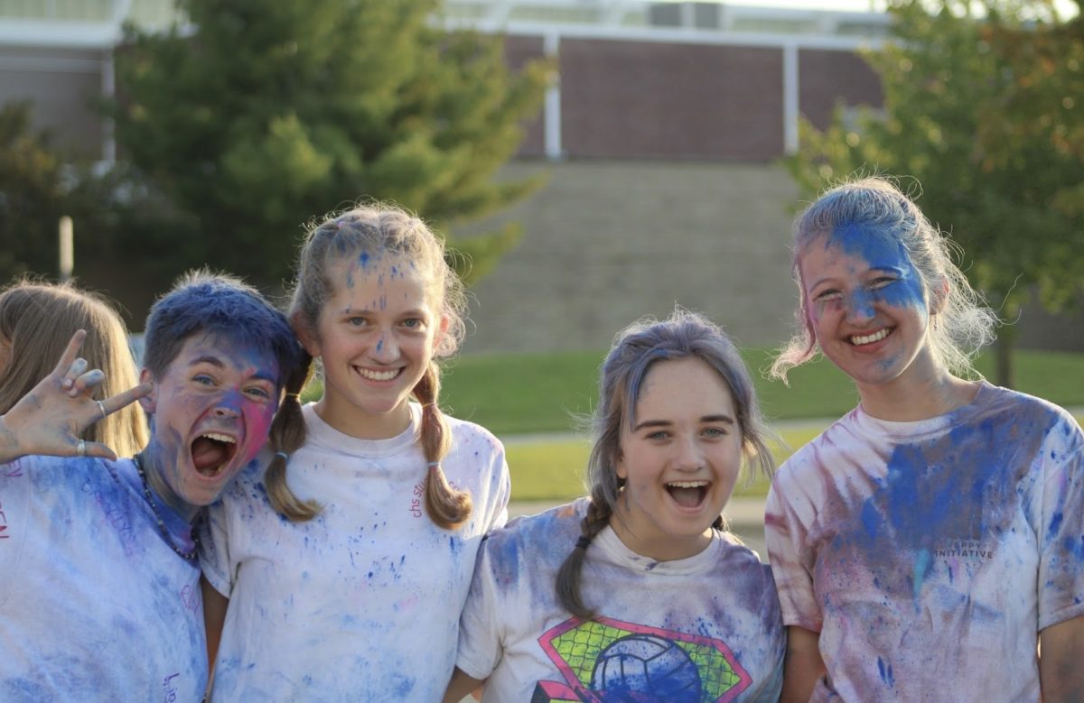 From left to right: friends Marah Putnam (‘24), Lauren Thompson (‘25), Ava Seitz (‘24) and Sonja Schemahorn (‘25) enjoy spending quality time together after being dusted by a blast of color.