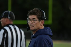 Noel Dean Takes Over as Varsity Football Head Coach, Players Adjust to New Changes and Offensive Strategy