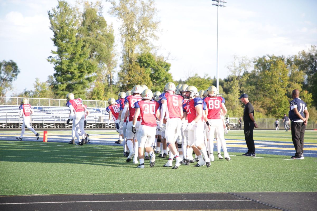 Noel Dean Takes Over as Varsity Football Head Coach, Players Adjust to New Changes and Offensive Strategy