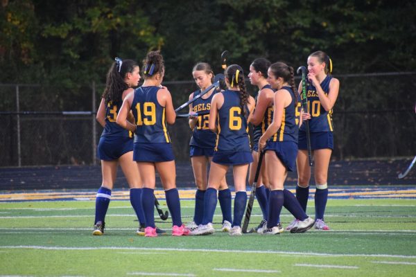 The Varsity starters huddle up before to clock starts back up