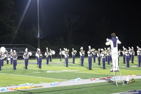 Balancing Football and Marching Band Under the Friday Night Lights