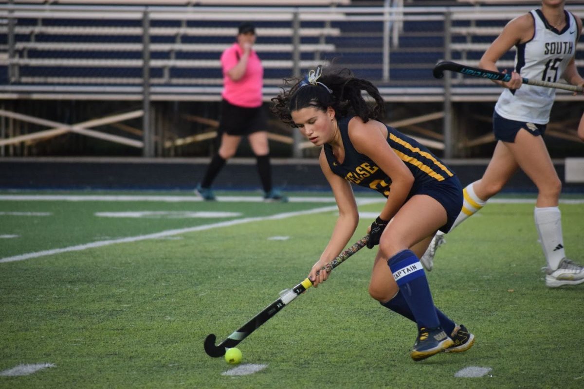 Lucia Taylor receives a pass that she will forward to a goal maker