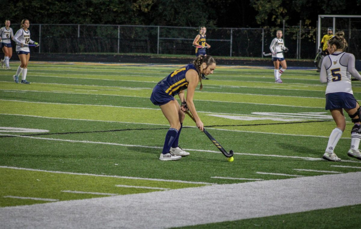 Senior defender Ceci Bayer pushing to get the ball up the field