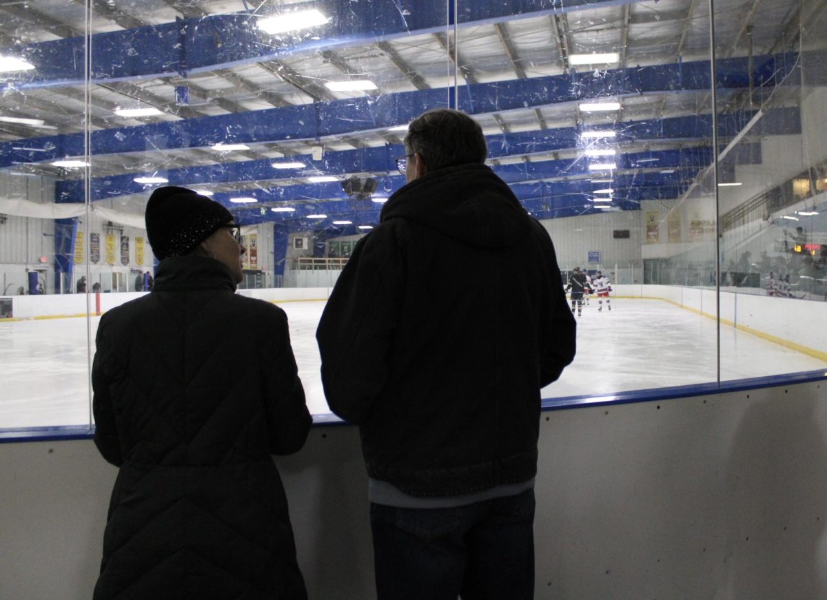 Parents at a hockey game